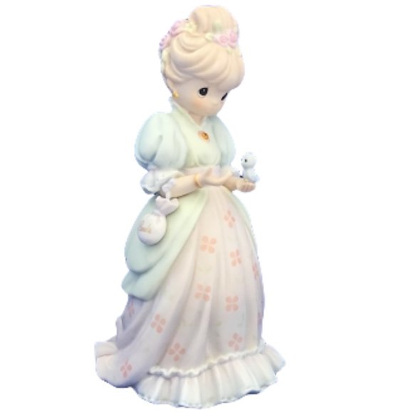 Charity Begins In The Heart - Precious Moment Figurine